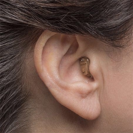 completely-in-canal-hearing-aid-in-the-ear Completely in Canal Hearing Aids. Hearing aid sat in the ear canal, nearly invisible.