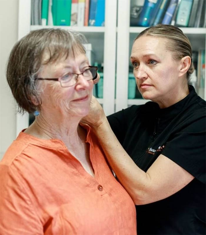 A senior female having earwax removed at Hear At Home Mobile Hearing Clinic in North Vancouver